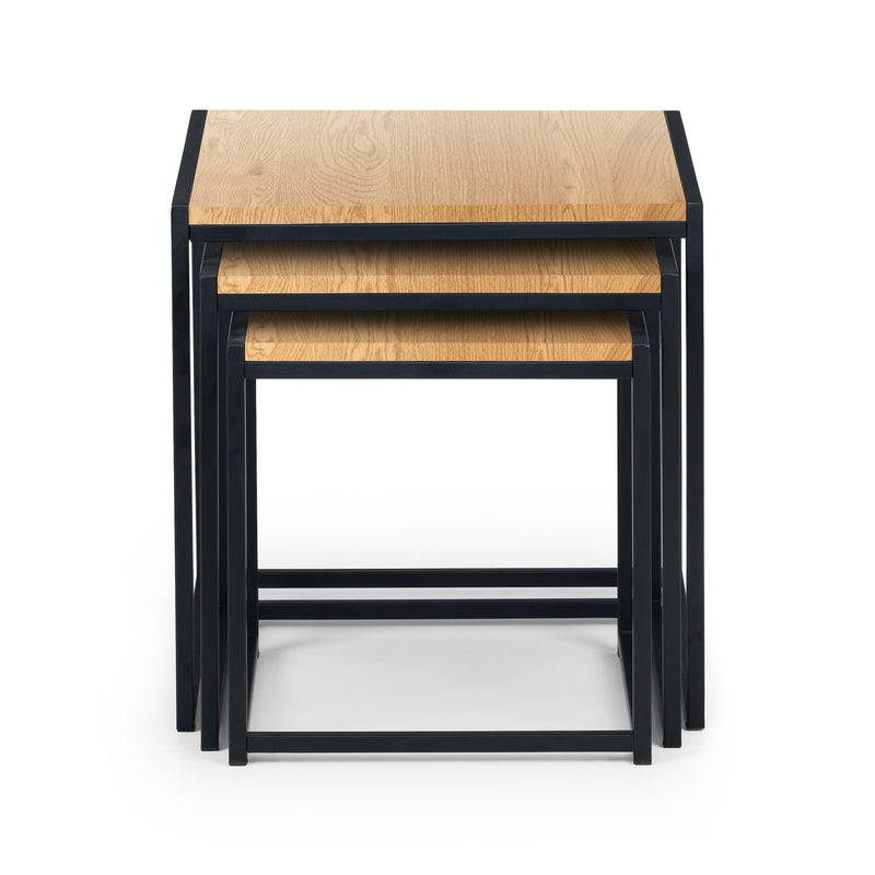 Set of three nesting tables with wooden tops and black metal frames on a white background