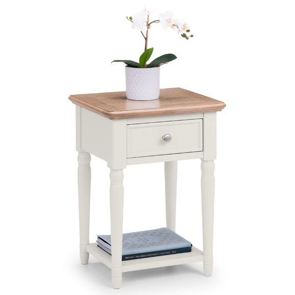 White side table with wooden top and drawer, featuring a potted plant on a white background.