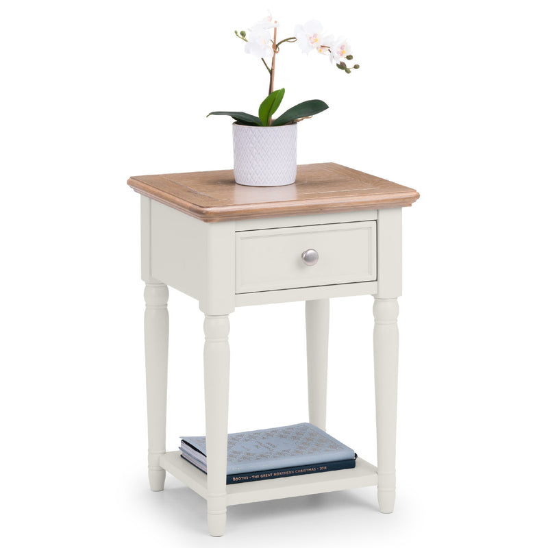 White side table with wooden top and drawer, featuring a potted plant on a white background.