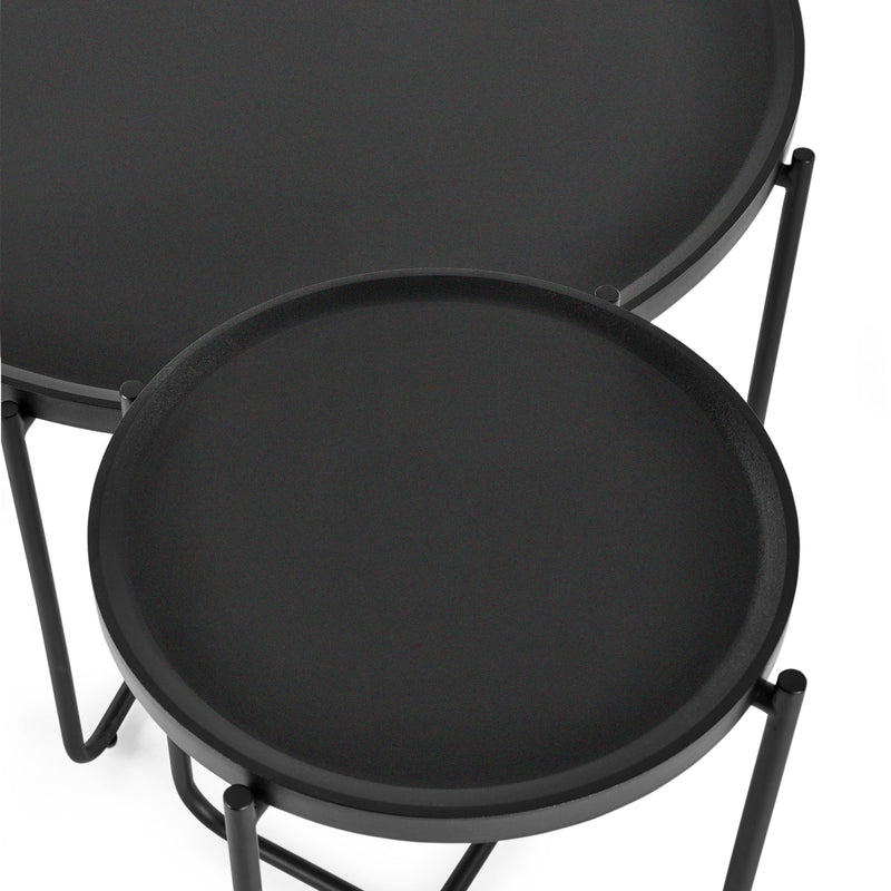 Two black round tables with metal frames on a white background