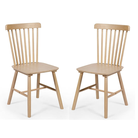 Two wooden chairs on a white background