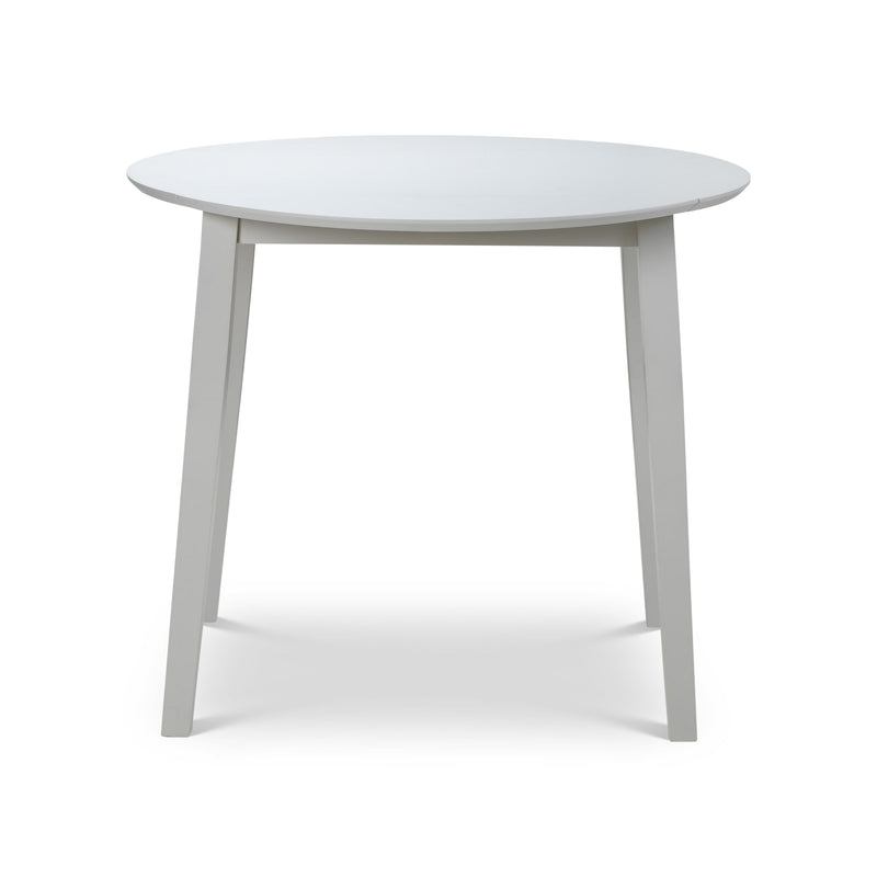 Round white table on a white background