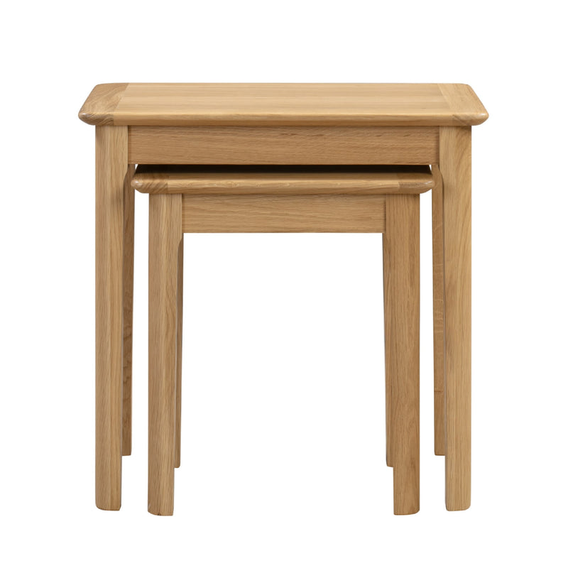 Set of two wooden nesting tables on a white background