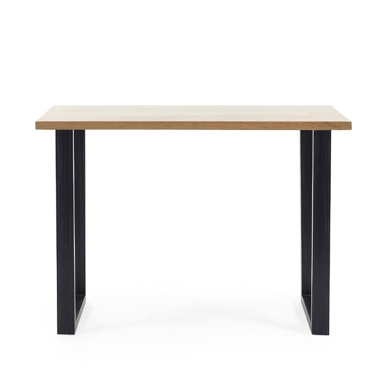 Table with a light wooden top and black metal legs on a white background