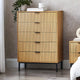 Wooden dresser with vertical slats in a bedroom setting