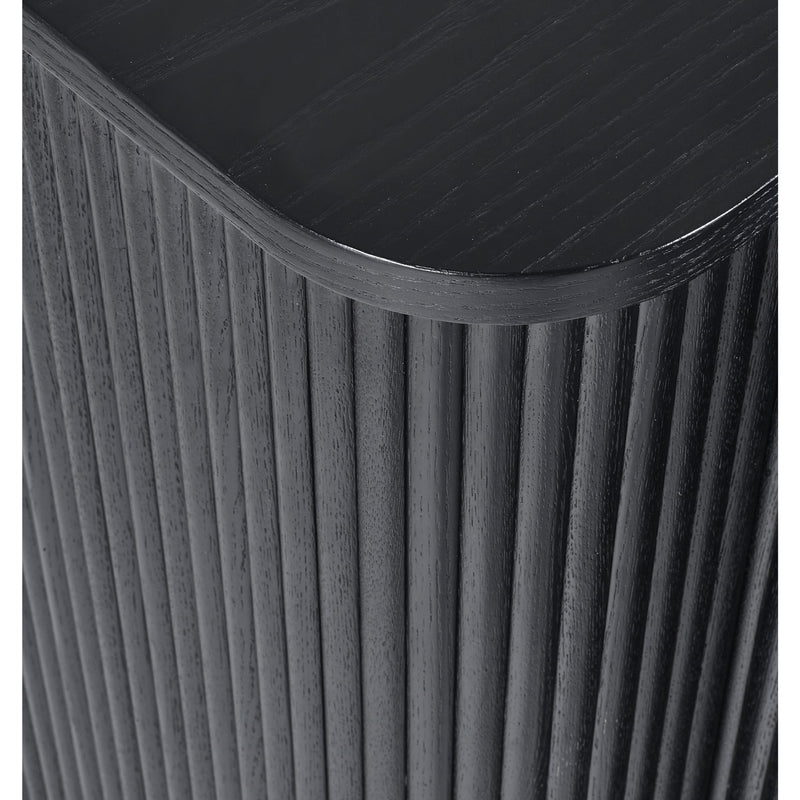 Close-up of a black cylindrical object with ribbed texture