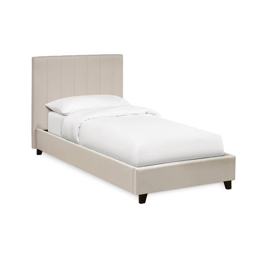 Beige upholstered bed with white bedding on a white background