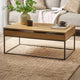 Wooden coffee table with decorative items in a living room setting