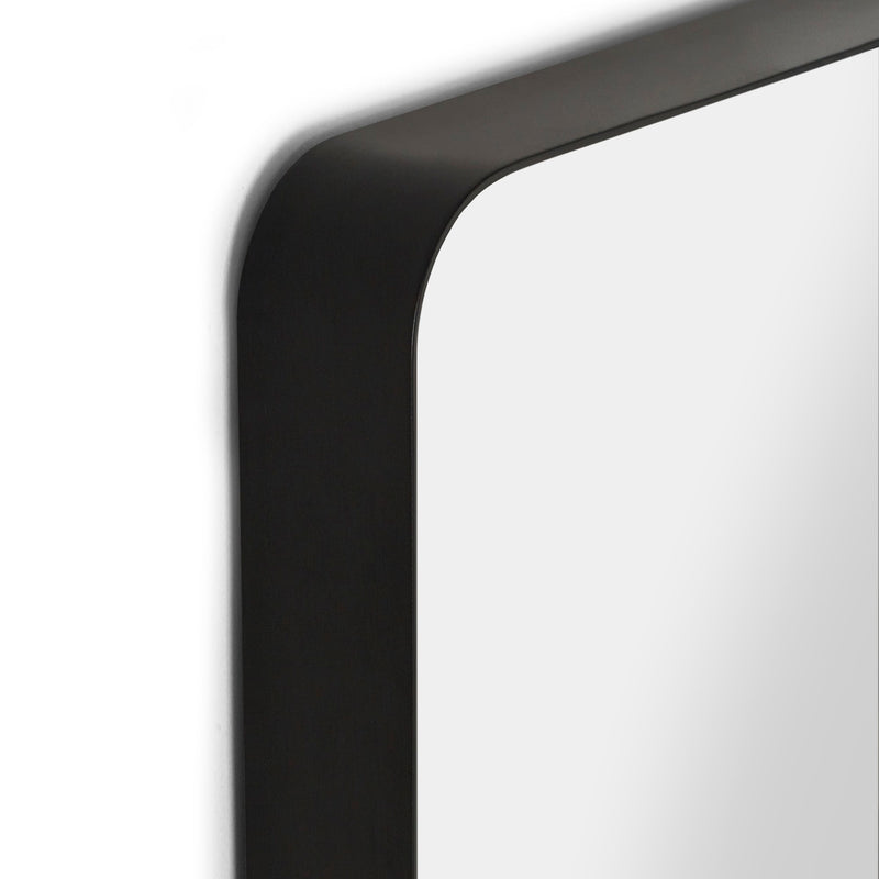 Close-up of a black metal frame corner on a white background