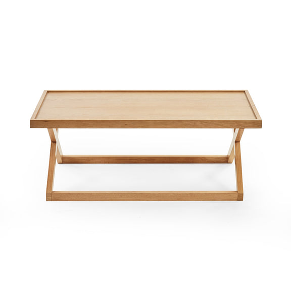 Wooden coffee table on a white background