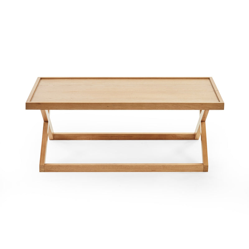 Wooden coffee table on a white background