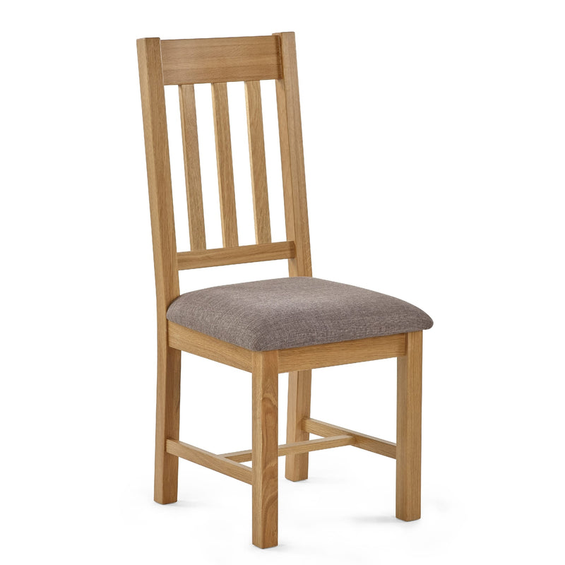 Wooden chair with a gray cushion on a white background