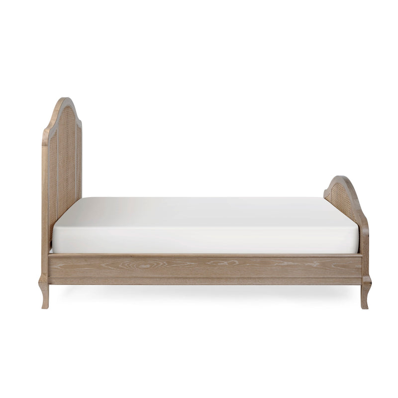 Wooden bed frame with white mattress on a white background