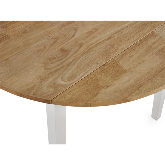 Wooden dining table with white legs on a white background