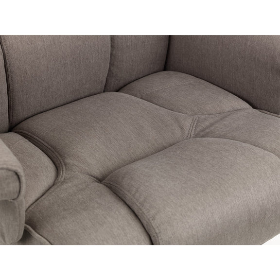 Close-up of a gray upholstered chair with tufted cushions on a white background