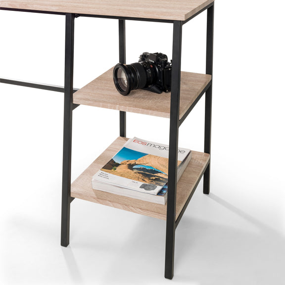 Two-tier wooden shelf with a camera on the top shelf and a magazine on the bottom shelf against a white background.