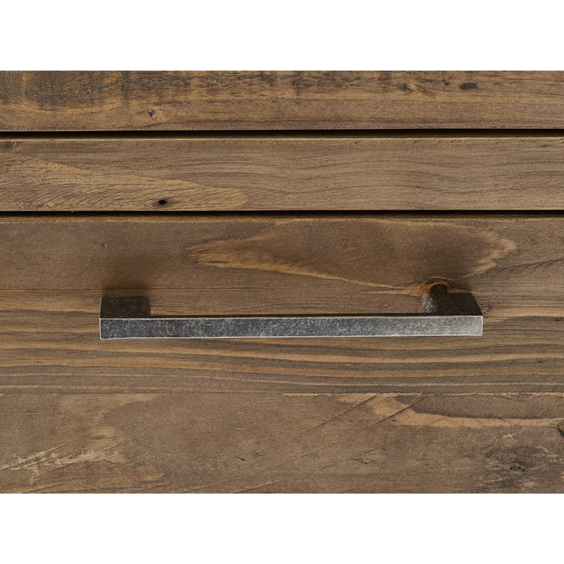 Wooden drawer with metal handle on a wooden surface