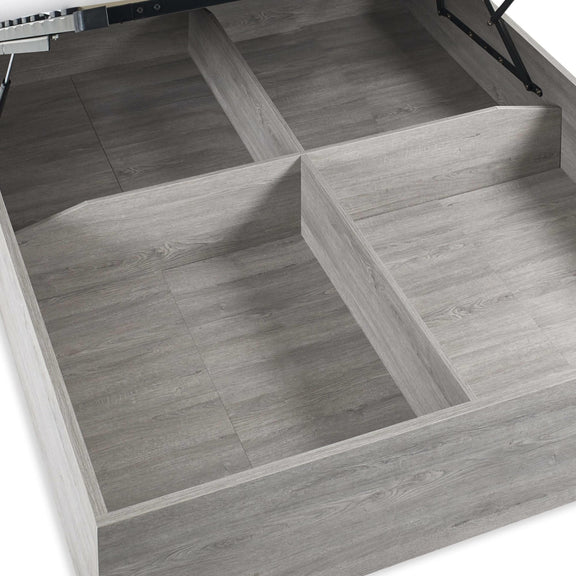 Wooden drawer with divided compartments on a white background