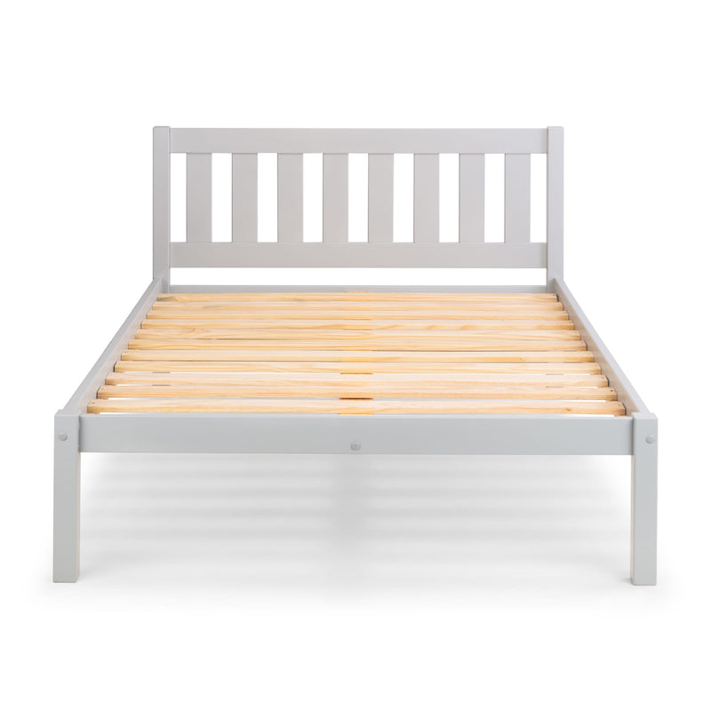 White wooden bed frame with slatted headboard on a white background