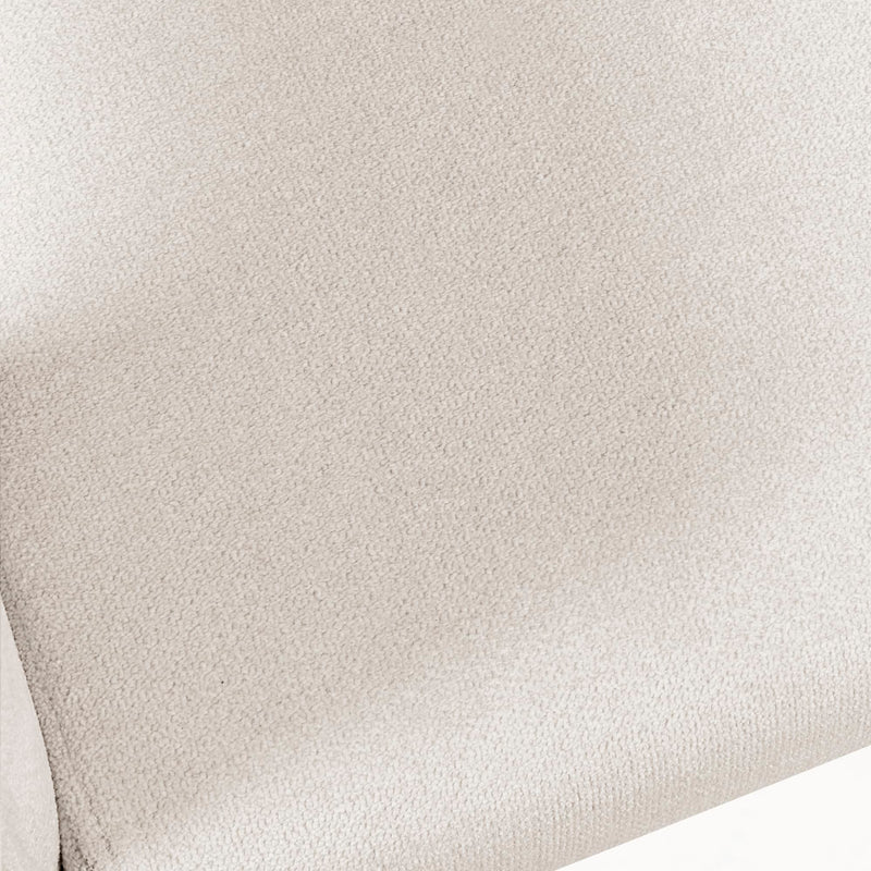 Close-up of a textured beige fabric with a subtle pattern