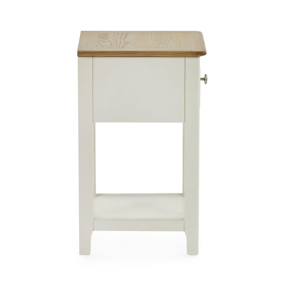 Rear view of white wooden bedside table with open shelf