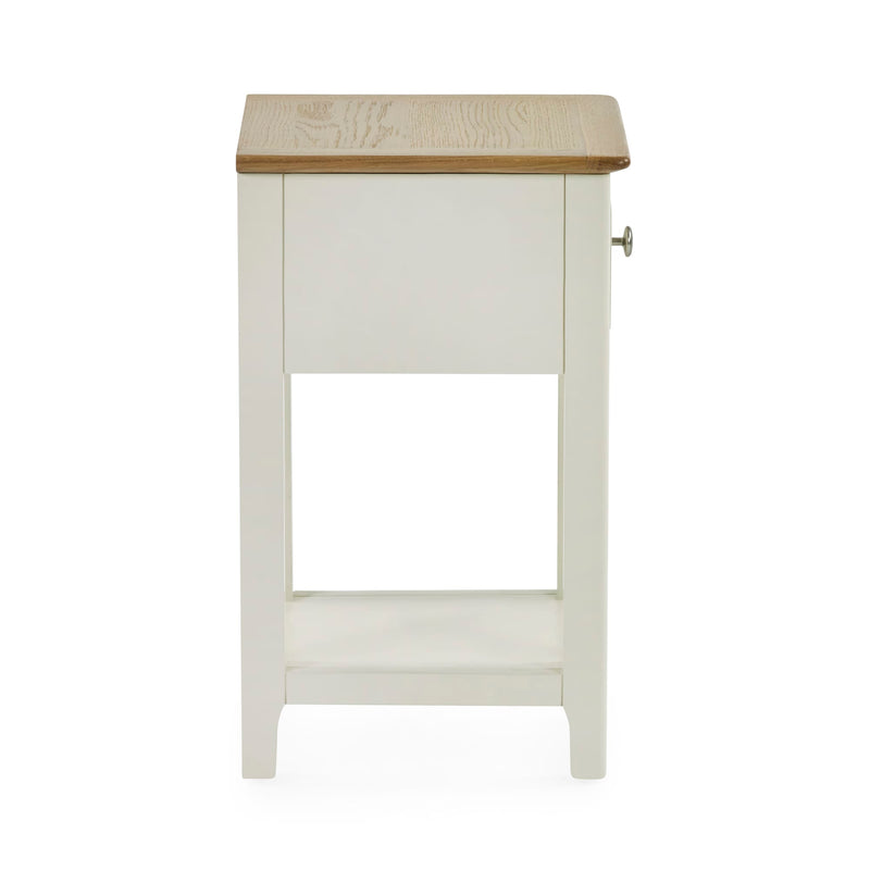 Rear view of white wooden bedside table with open shelf