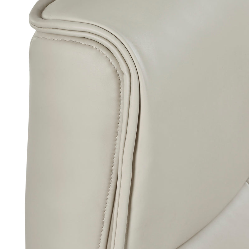 Close-up of a light gray leather chair with visible stitching on a white background