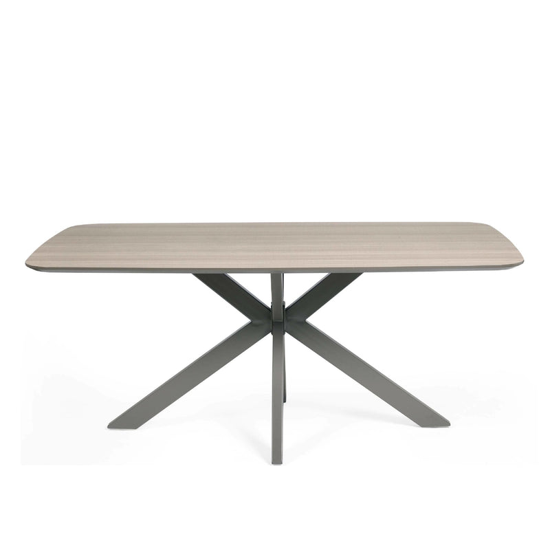 Rectangular table with a light brown top and dark metal legs on a white background