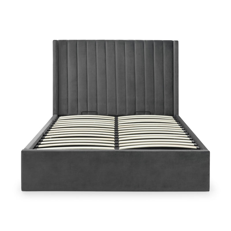 Dark gray upholstered bed frame on a white background