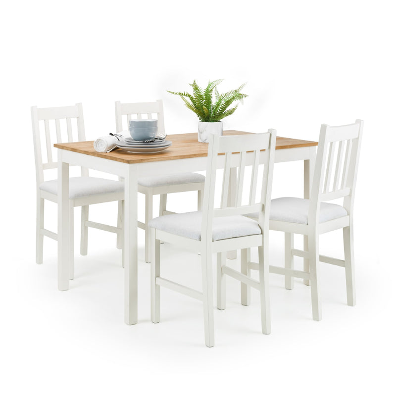 Dining set with wooden table and white chairs on a white background