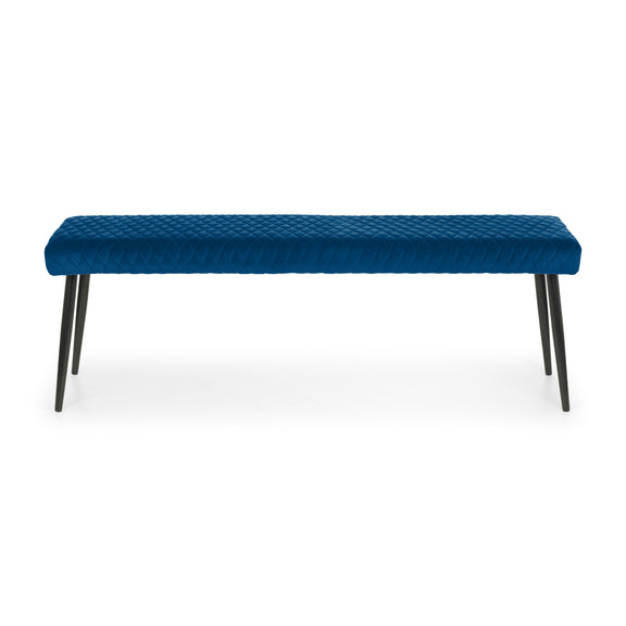 Blue bench with quilted design on a white background