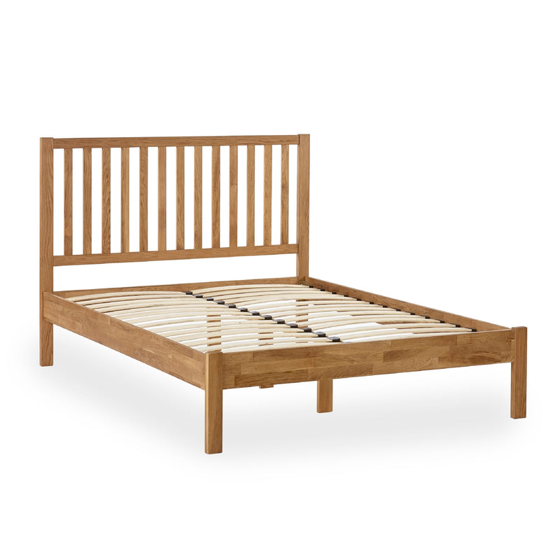 Wooden bed frame on a white background