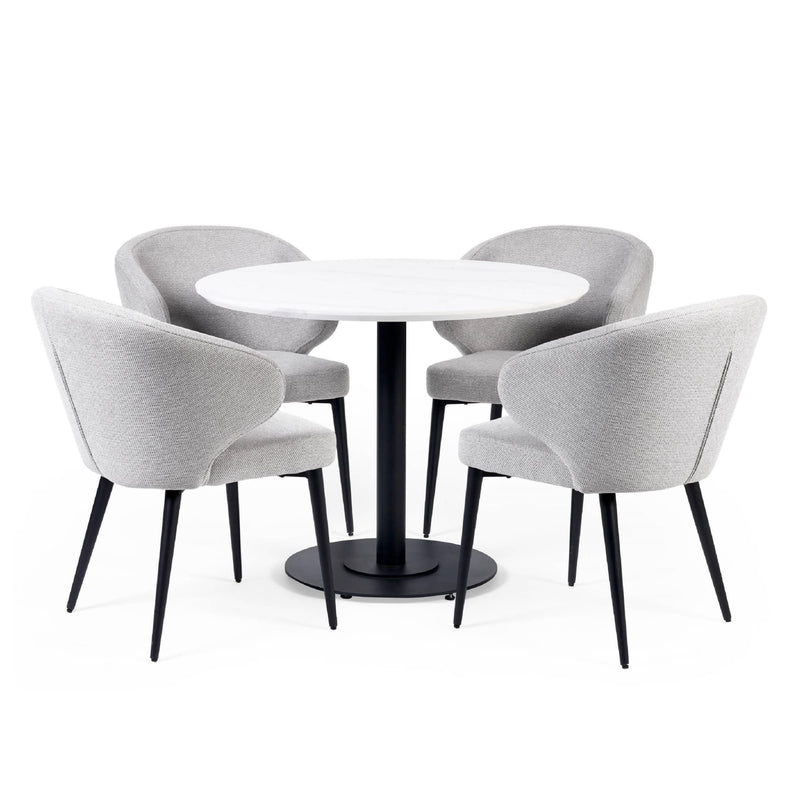 Round white table with four gray chairs on a white background