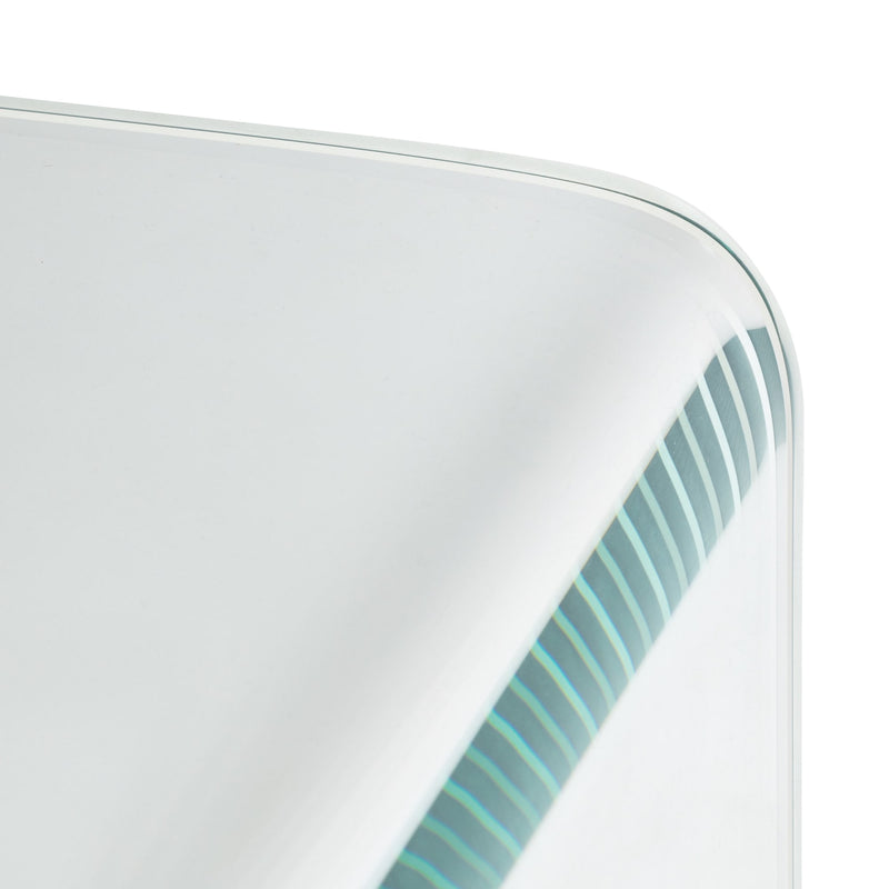 Close-up of a white plate with a green stripe on a white background