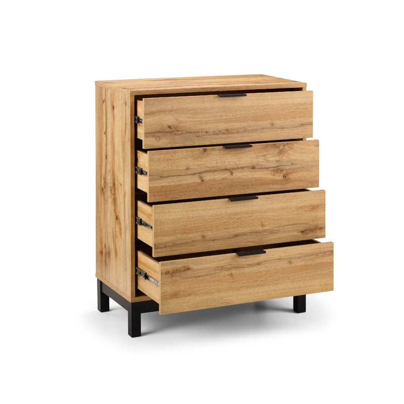 Wooden dresser with four drawers on a white background
