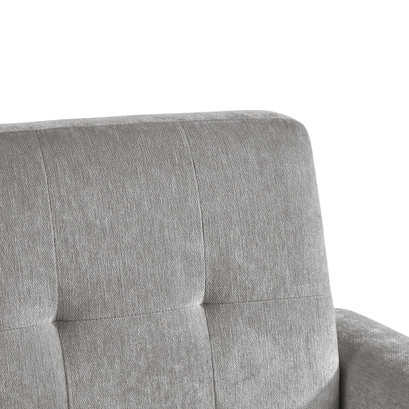 Gray upholstered chair with tufted design on a white background