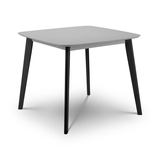 Square table with black legs on a white background