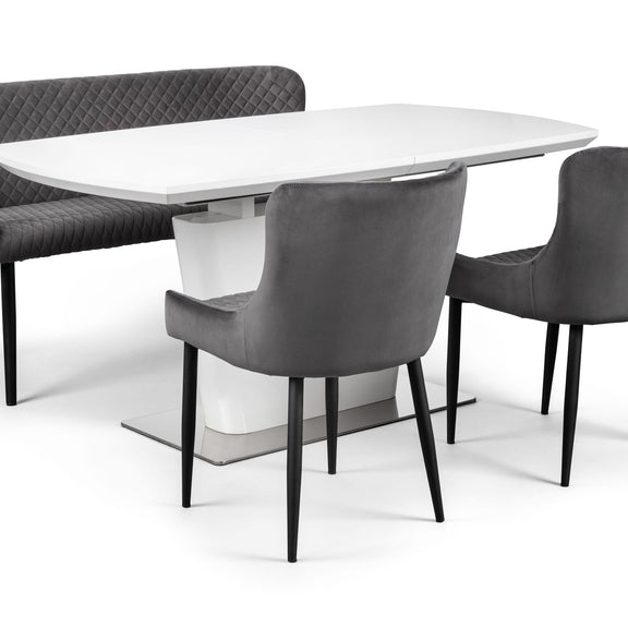 Dining table with gray chairs on a white background