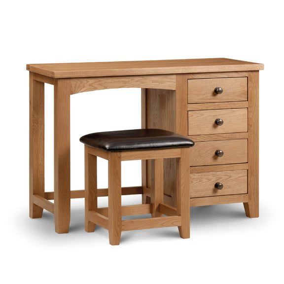 Wooden desk with three drawers and a matching stool on a white background