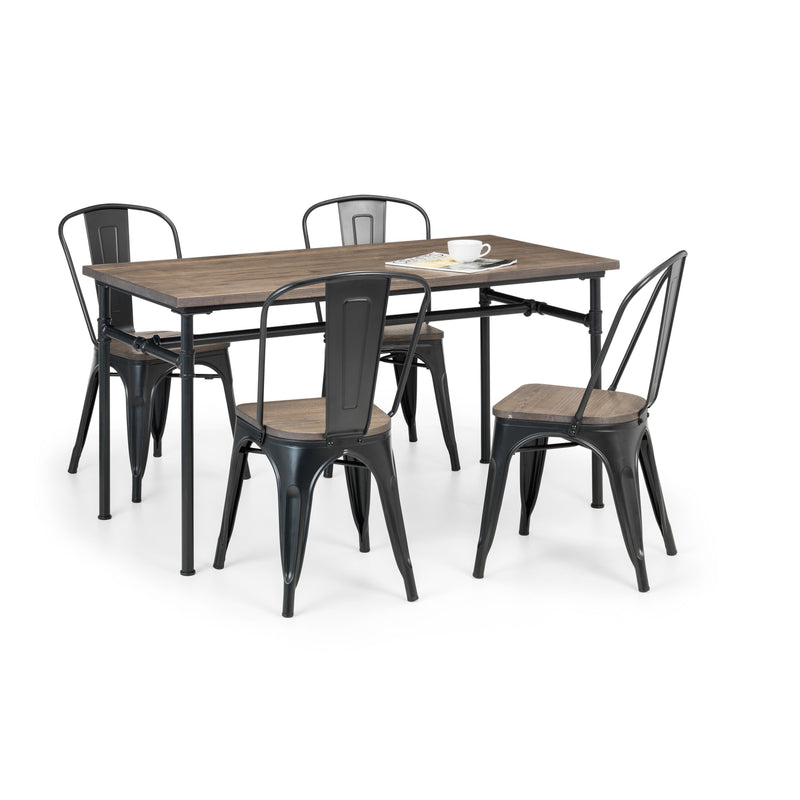 Dining set with wooden table and black metal chairs on a white background