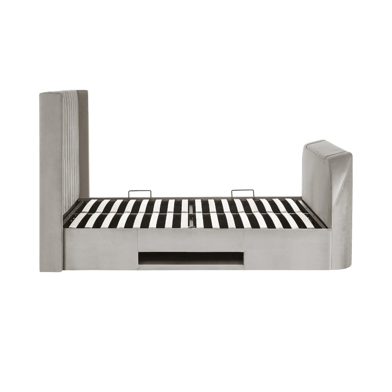 Modern bed with striped mattress on a white background