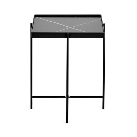 Black side table with glass top on a white background