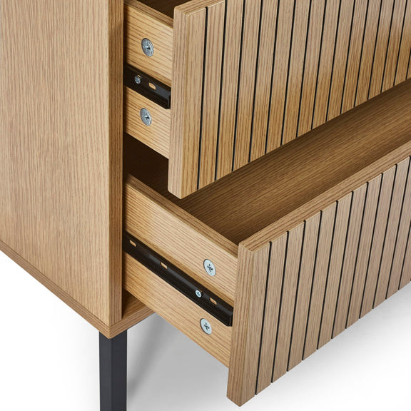 Wooden cabinet with open drawers on a white background