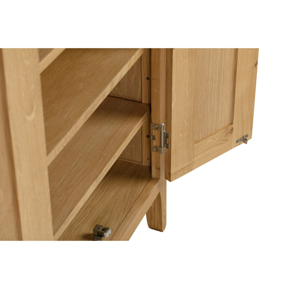 Wooden cabinet with open door on a white background