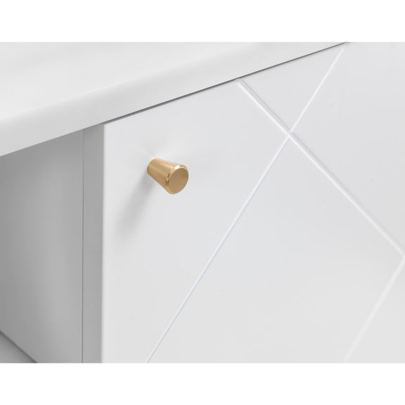 Close-up of a white cabinet with a gold handle