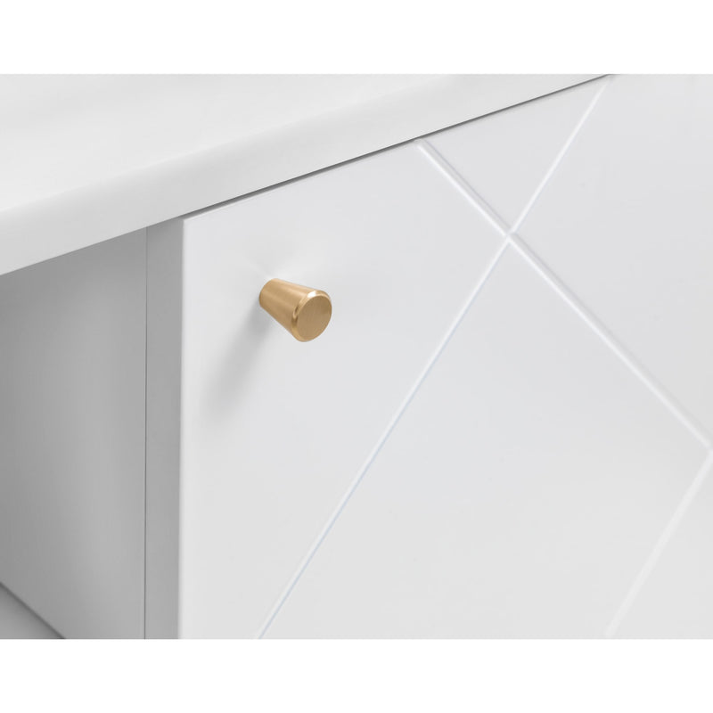 Close-up of a white cabinet with a gold handle