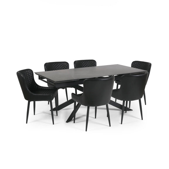 Black dining table with six chairs on a white background