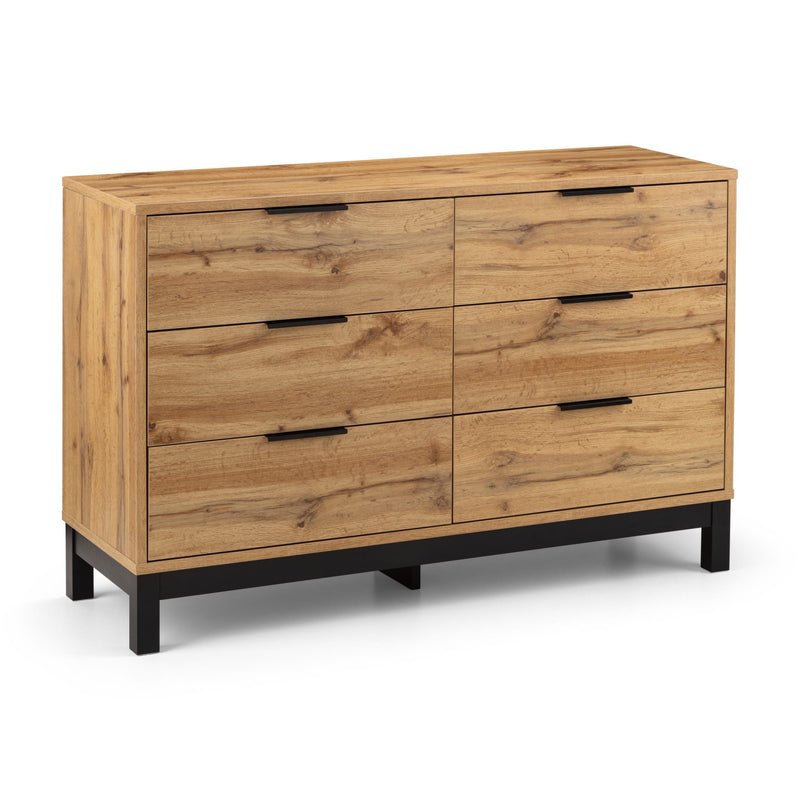 Wooden dresser with six drawers on a white background