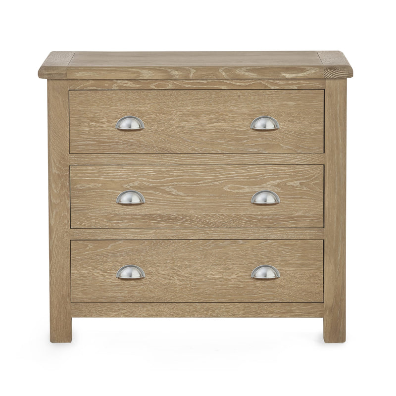 Wooden dresser with three drawers and metallic handles on a white background