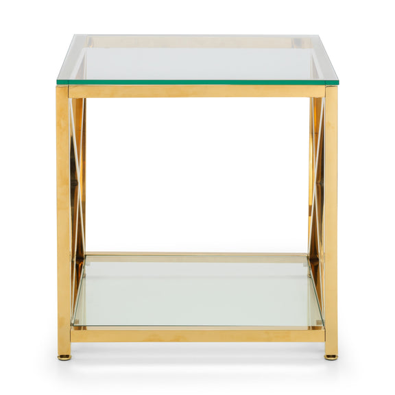Gold side table with glass top and shelf on a white background